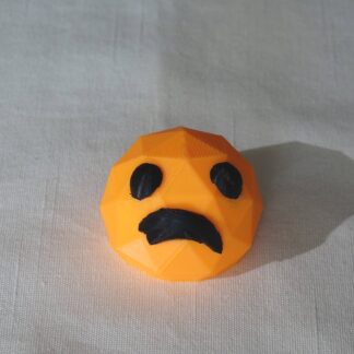 Hymiö Kulmikas 4., väri: oranssi/musta, leveys: n. 50mm, korkeus: n., 35mm