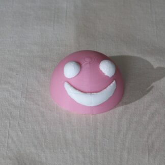 Hymiö 1., väri valkoinen/pinkki leveys: 50mm, korkeus: n. 30mm